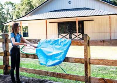 Person Cleaning TroughSaver Liner